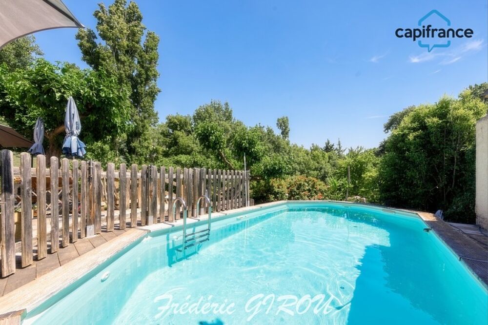 Maison de plain pied 130m² (5 pièces) avec studio, piscine sur 1300m² AIX / PUYRICARD (13540)