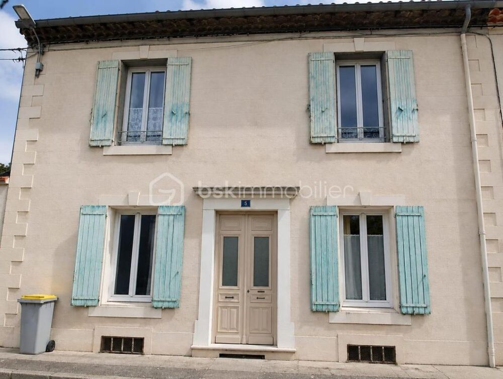 MAISON DE VILLE AVEC JARDIN