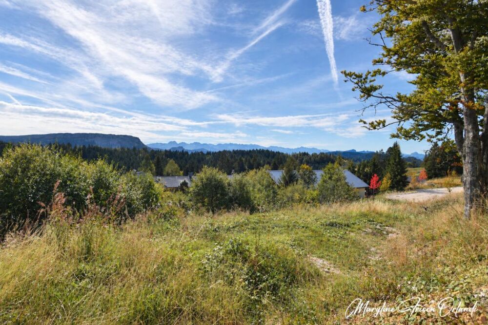 Vente Terrain LE REVARD – TERRAIN À BÂTIR DE 985 M² AVEC VUE PANORAMIQUE SUR LES BAUGES Les deserts