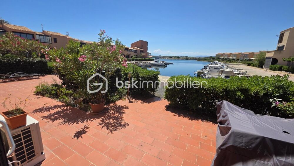 EXCLUSIVITE  Exceptionnel 3 pièces naturiste en RDC avec immense terrase et vue exceptionnelle sur la marina et le Canigou !