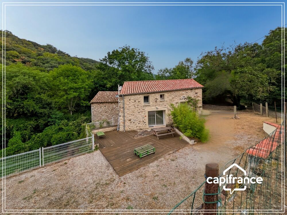Ancien moulin en pierre rénové  Charme, confort et nature au coeur du Haut-Languedoc
