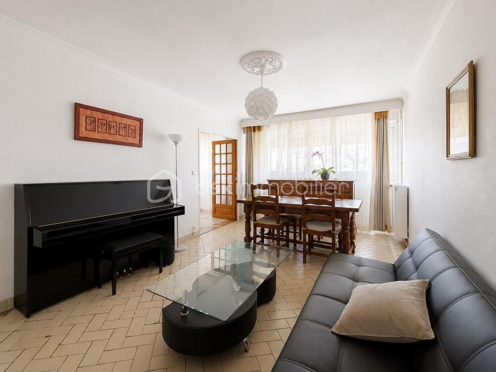 Appartement T5 - 104m² avec balcon, parking et cave