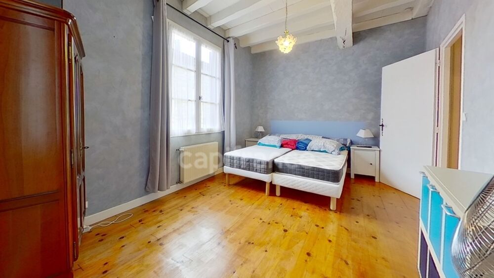 Maison de ville - colombages - pierres apparentes - 1 chambre à CASTELJALOUX (47)