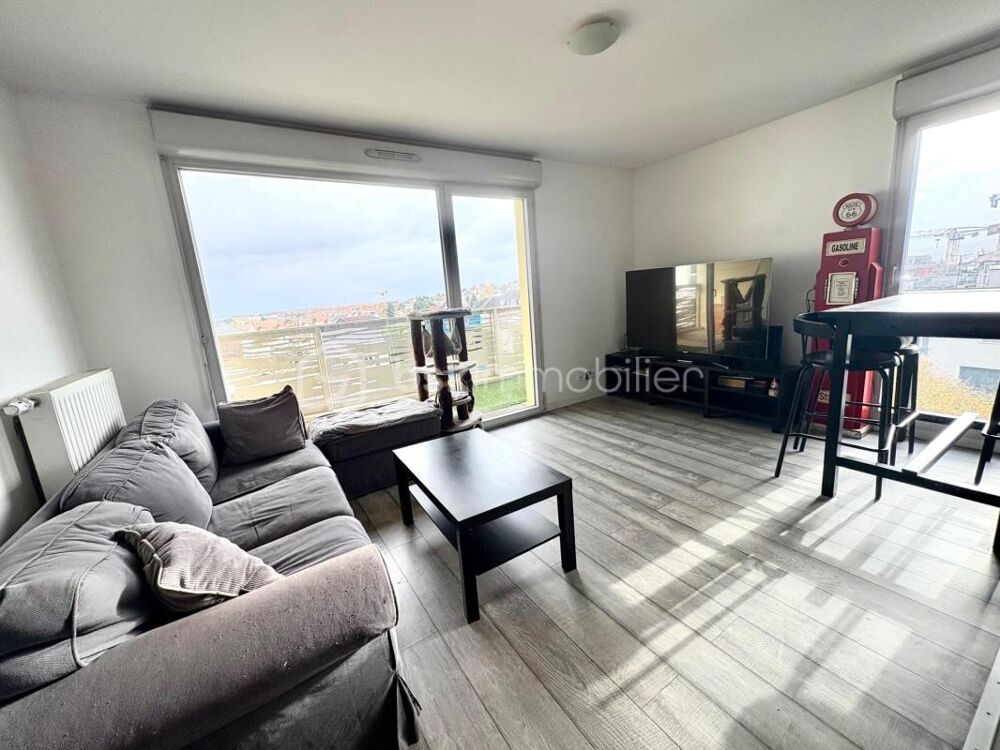 Appartement F4 avec balcon et 2 places de parkings en sous sol