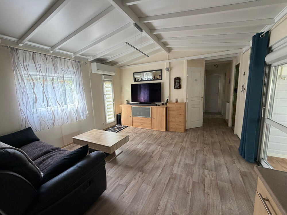 SAINT CYR EN TALMONDAIS (85) DANS RESIDENCE AVEC PISCINE CHALET BOIS 3 CHAMBRES AVEC VERANDA ET JARDIN