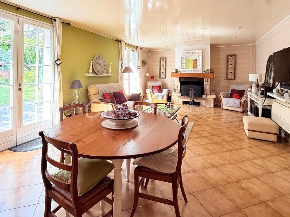 Maison spacieuse avec terrasse et jardin dans un cadre serein