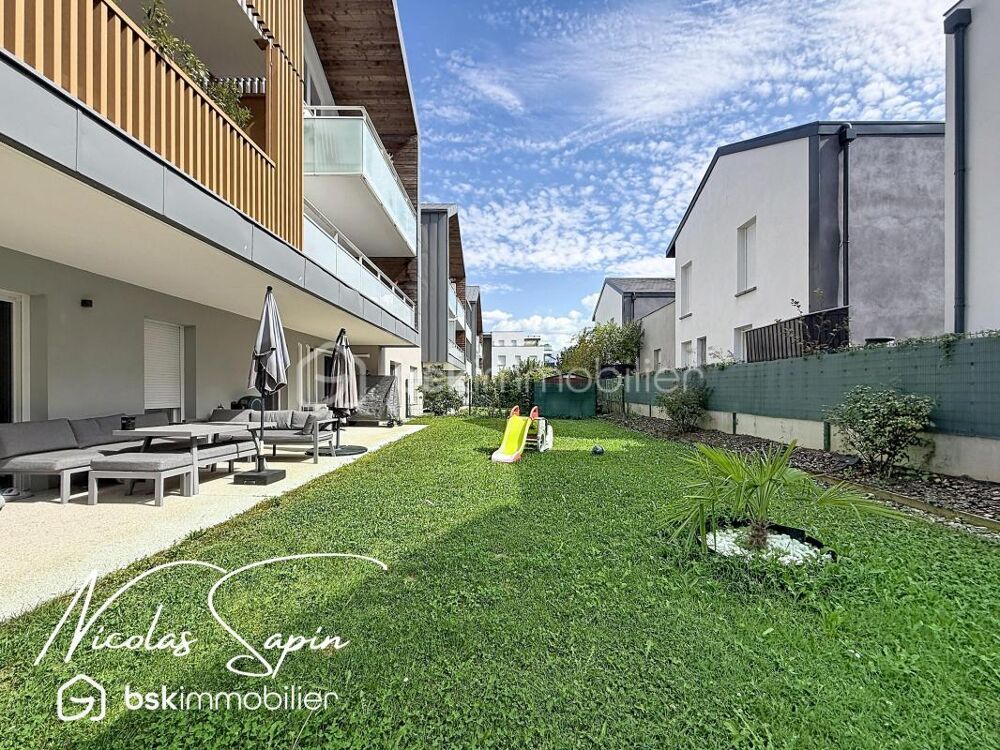 Appartement T4 en rez de jardin avec garage et place de parking privée