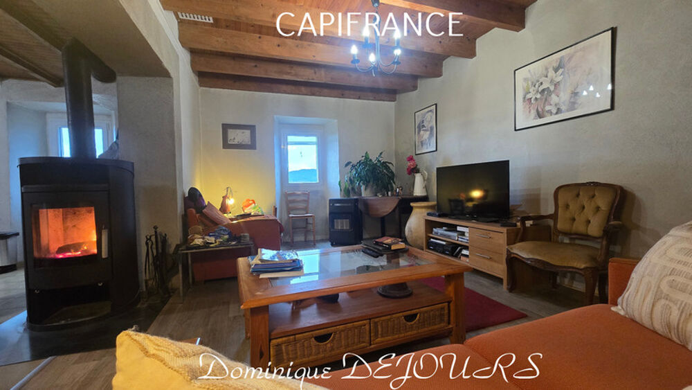 Proche d'Albon d'Ardèche dans la vallée de la Glueyre, maison de 95m² avec un garage, terrasse et terrain