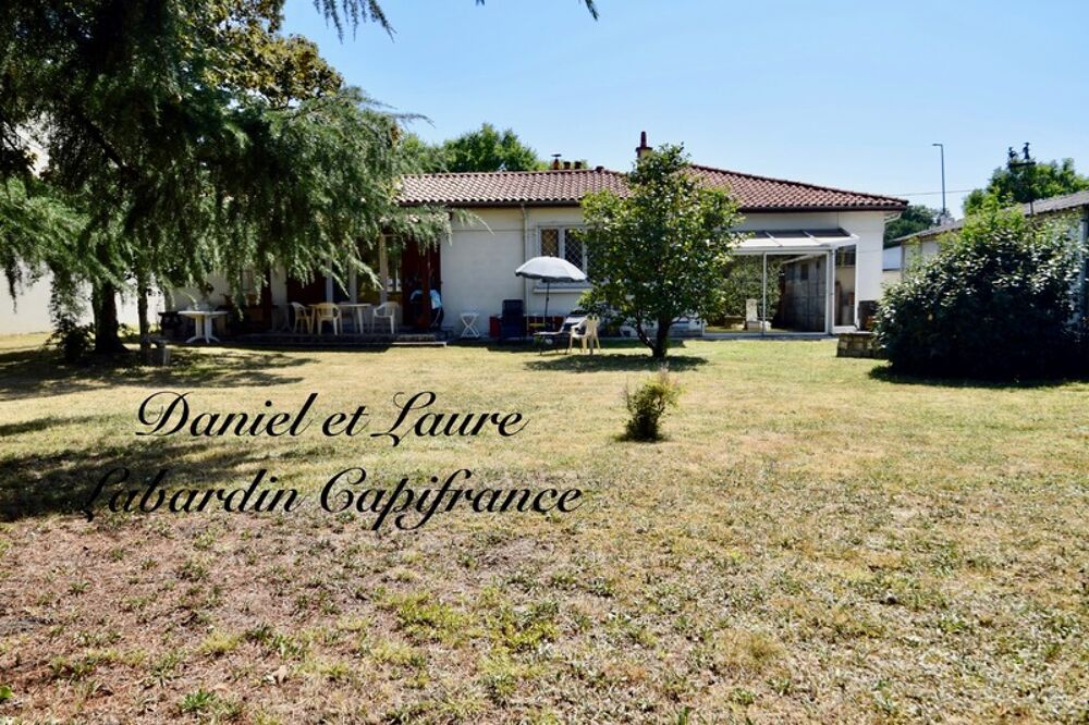Maison de plain-pied - 4 chambres - garage - terrain clos