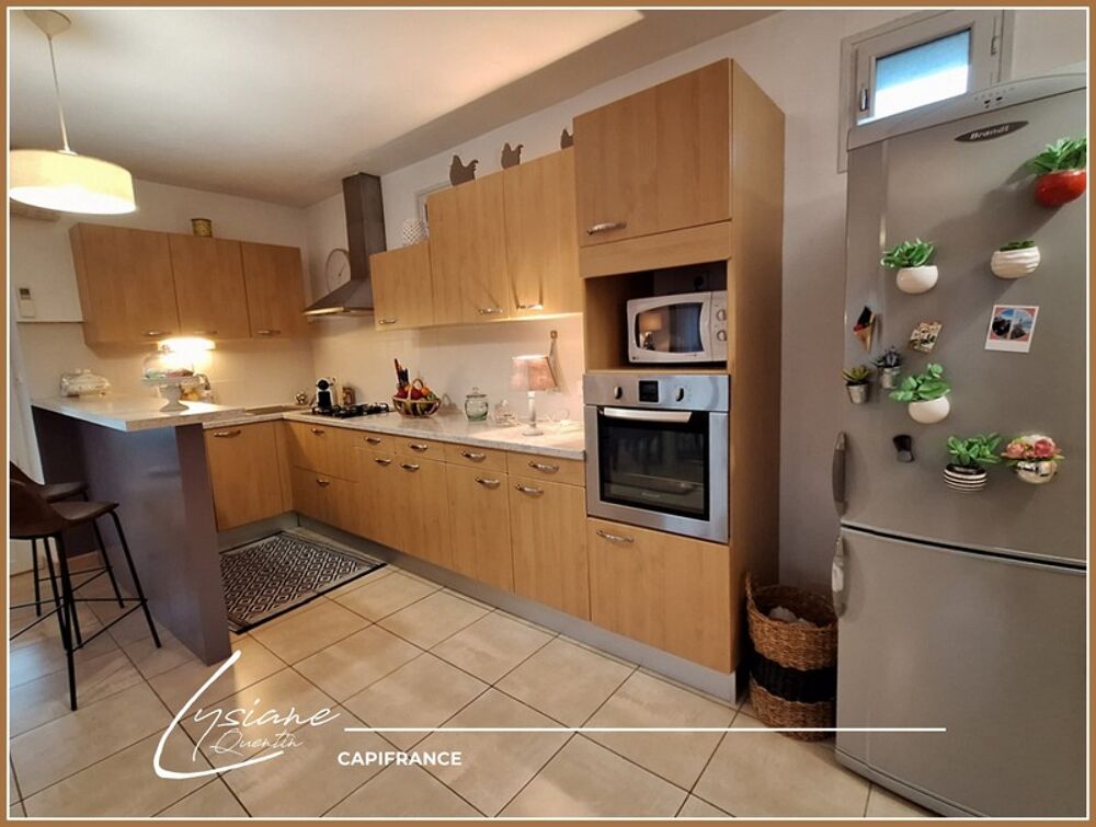 ENSEMBLE IMMOBILIER AVEC MAISON D'HABITATION ET 3 APPARTEMENTS LOUES, 5 DEPENDANCES, GRENIER