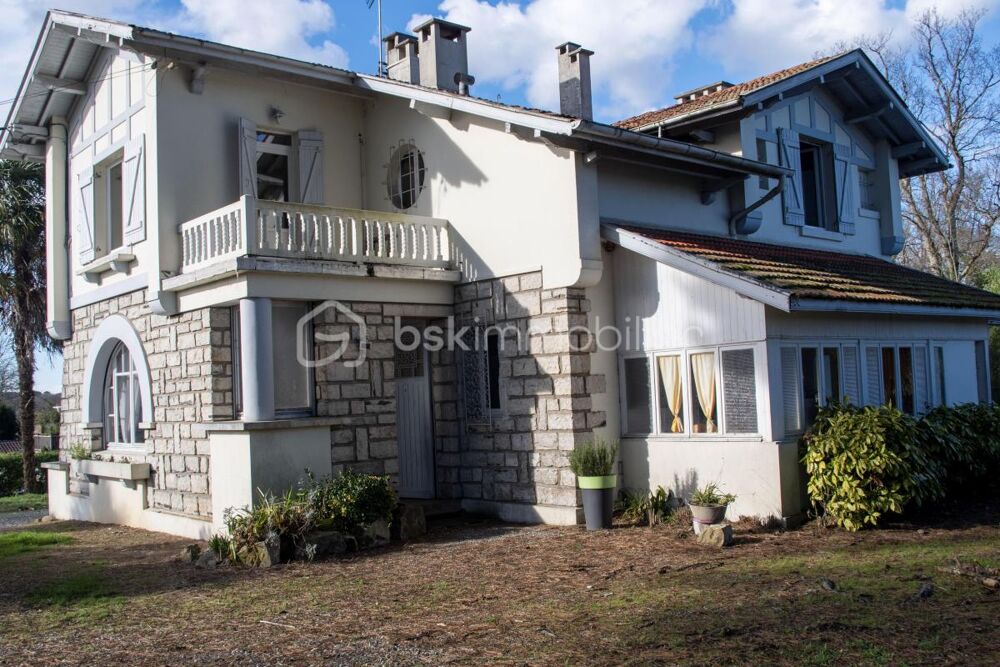 Lac Christus - Appartement de caractère T3 de 80 m2 + véranda de 10 m2 + cave de 50 m2 + parking extérieur