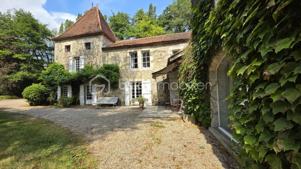 MOULIN ET DEPENDANCES -JARDIN DE 4 HECTARES