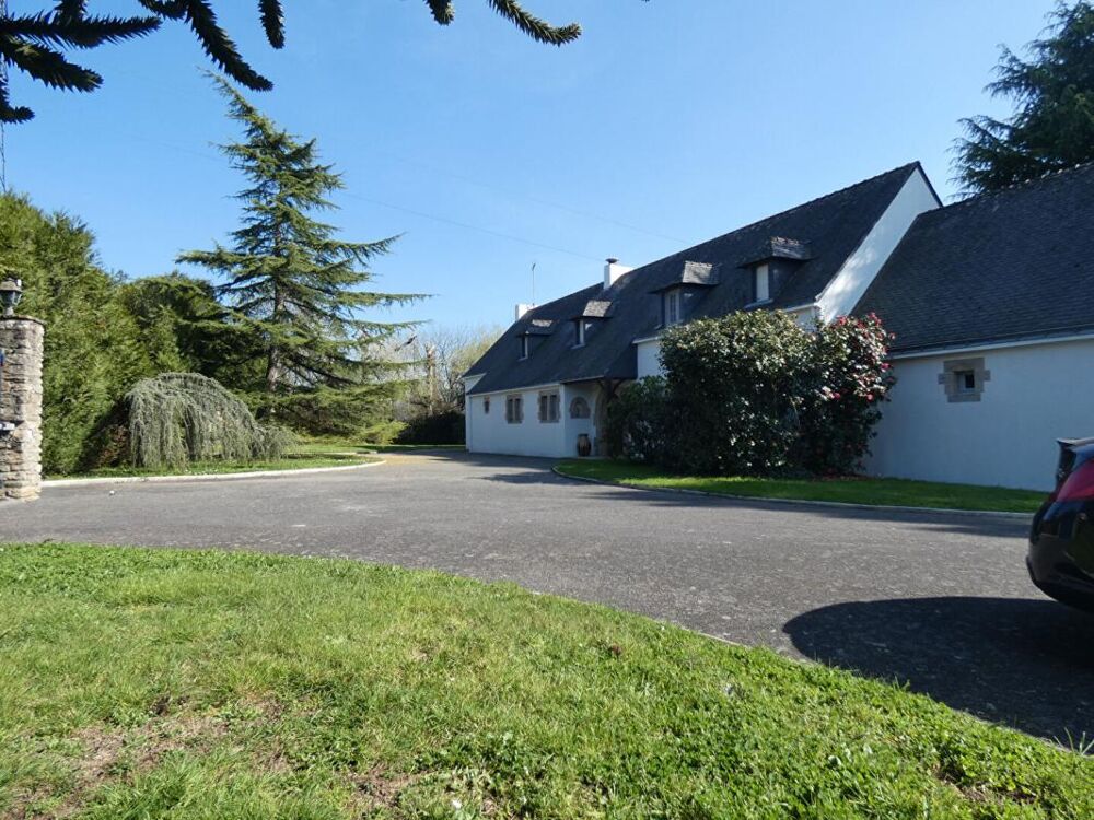 Propriété dans un parc arboré de 2 ha