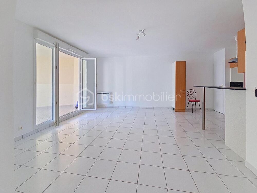 Appartement F3 avec grande loggia de 12m², cave + parking