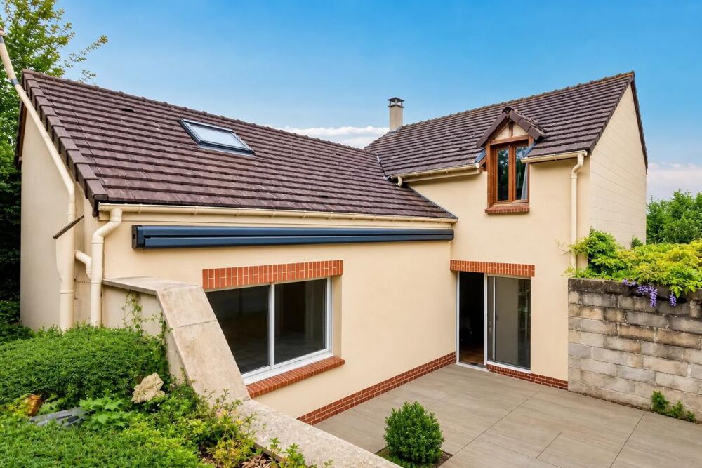 Maison 7 pièces de 138,34 m² avec terrasse, cheminée et terrain