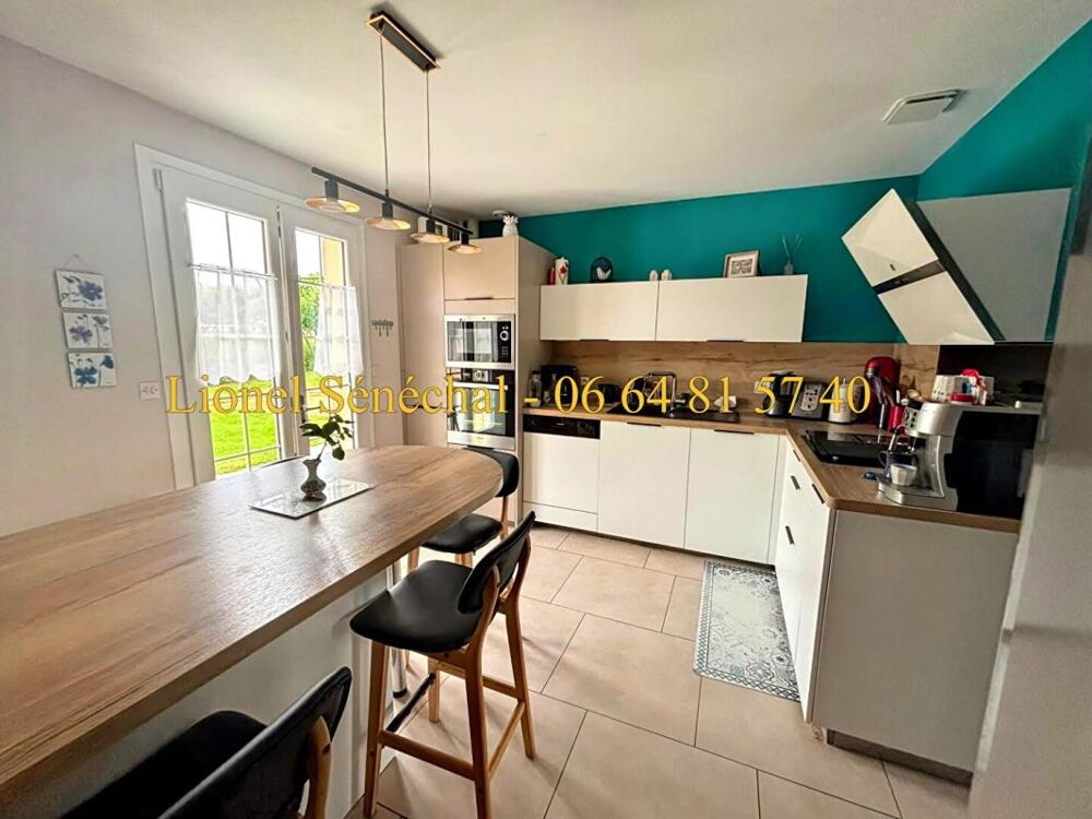 Vente Maison Maison lumineuse et peu énergivore 9 pièces de 138 m2 habitables (165 m2 au sol) sur une parcelle de plus de 1 200 m2 Laigne en belin