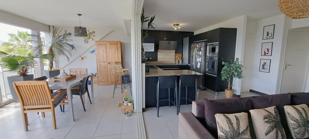 Élégance et confort aux Trois-Îlets : « Appartement raffiné 4 pièces , vue mer imprenable et prestations exclusives »