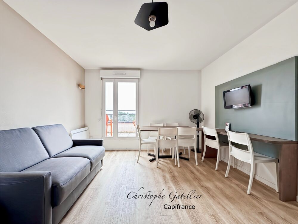 Investissement LMNP sécurisé  Grand appartement 2 chambres en résidence daffaires - Bail commercial jusqu'en 2032  Loyer gar