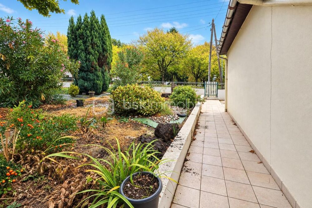 Maison de plain pied - 95m² - Jardin et garage