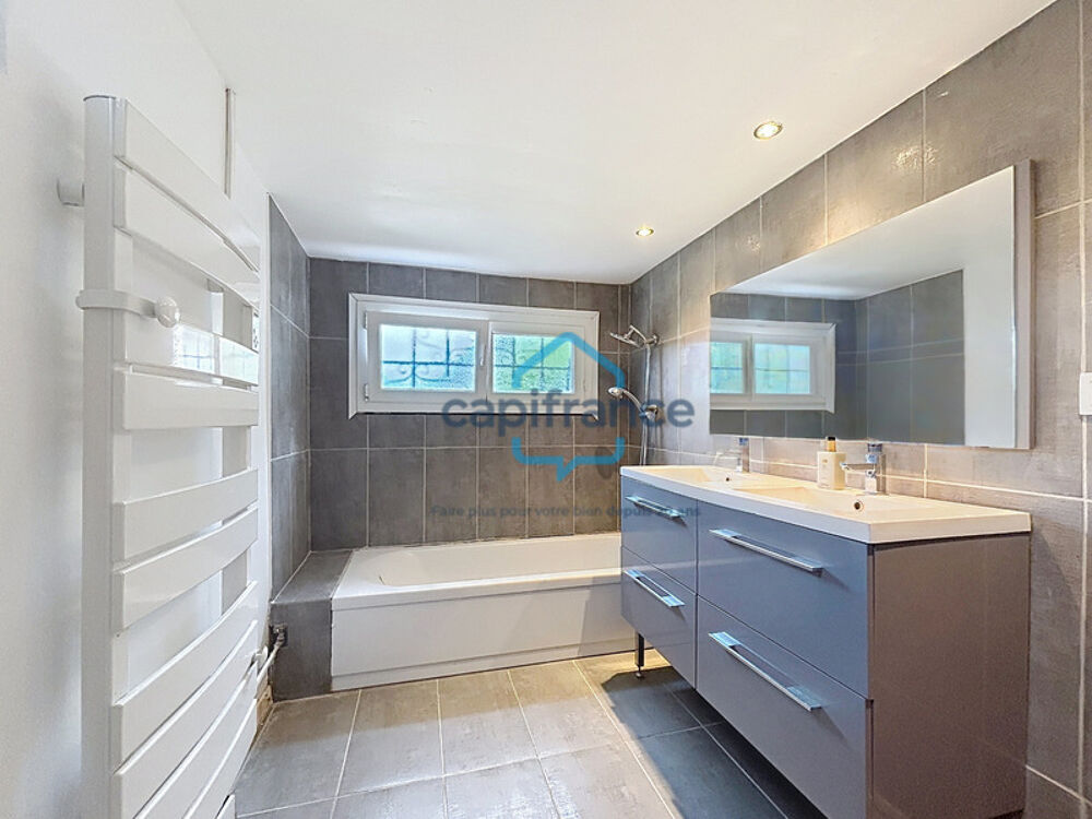 Maison familiale de 118 m² sur un terrain de 810 m² avec garage, cave et climatisation