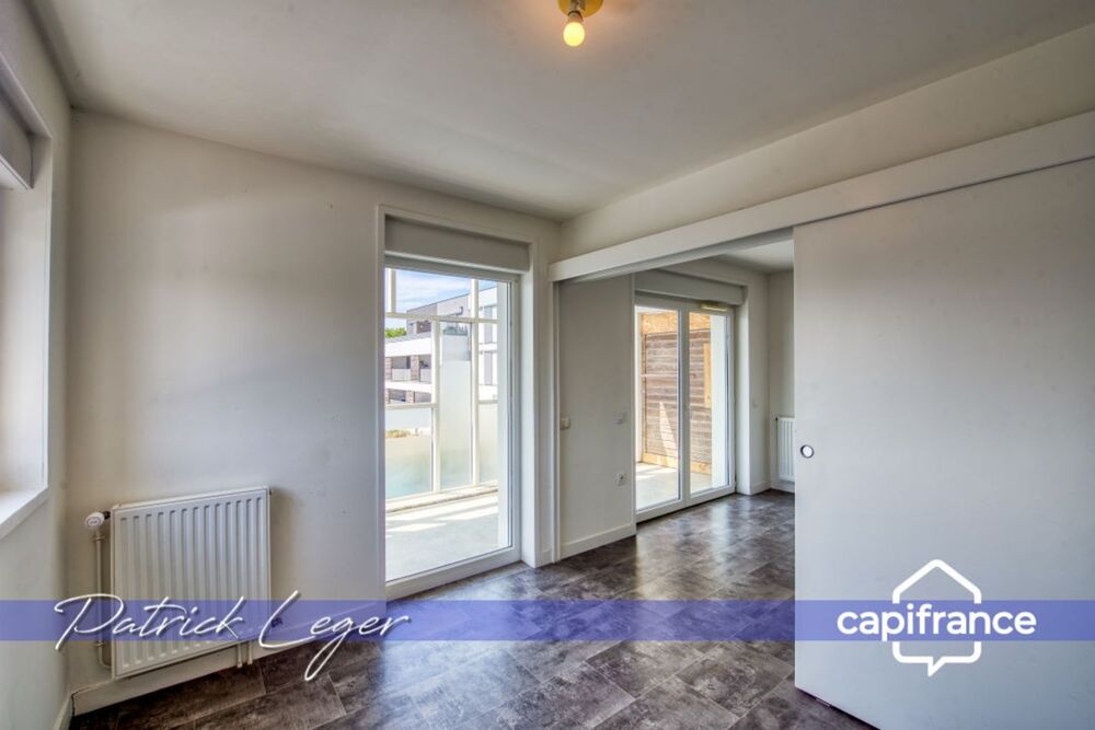 PÉRIGNY (17)  Élégant T3 modulable avec grande terrasse couverte & parking sous-sol