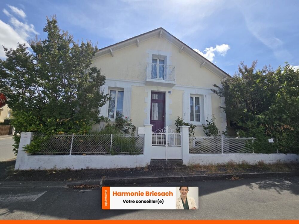 Maison familiale avec grand jardin, terrasse couverte et garage