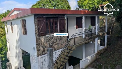   Maison de 10 pièces à vendre au Marigot (97225) proche du centre ville Maison - 10 pièce(s) - 398 m²