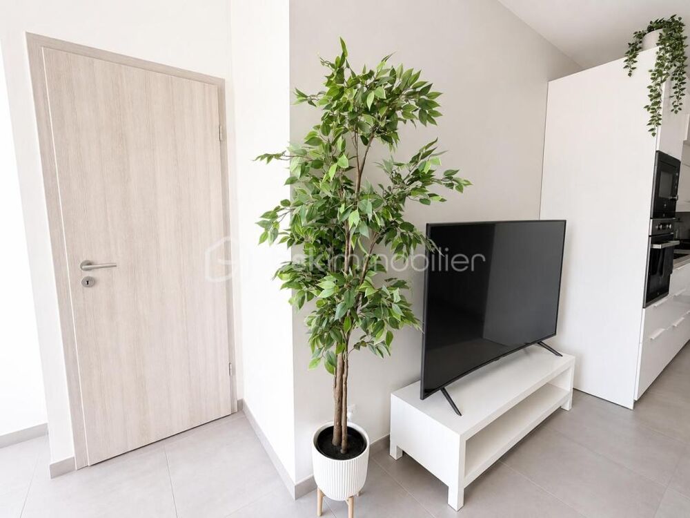 Appartement 3 pièces de 64 m² avec terrasse et box en sous-sol  Résidence récente de 2021