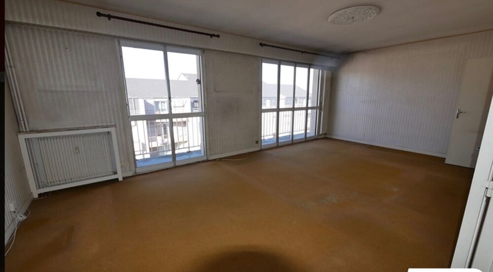Appartement T5 de 100 m² avec balcon, ascenseur, cave et stationnement  Fort potentiel à Limoges