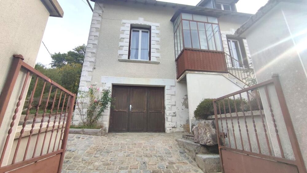 Maison avec terrain et garage , quartier calme d'USSEL 19200