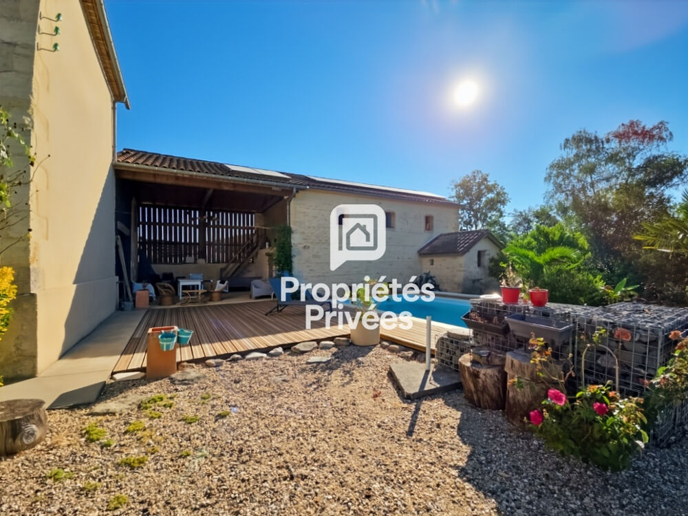 Maison en pierre de 185 m² avec piscine, dépendance et parc arboré à 10 min de Marmande
