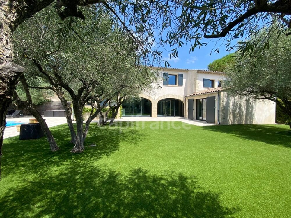 Vente Maison À SAINT MAXIMIN (30) Splendide propriété de 280 m², à 5 min d'Uzès proche de toutes commodités, sur un terrain clos et arboré d' Saint maximin