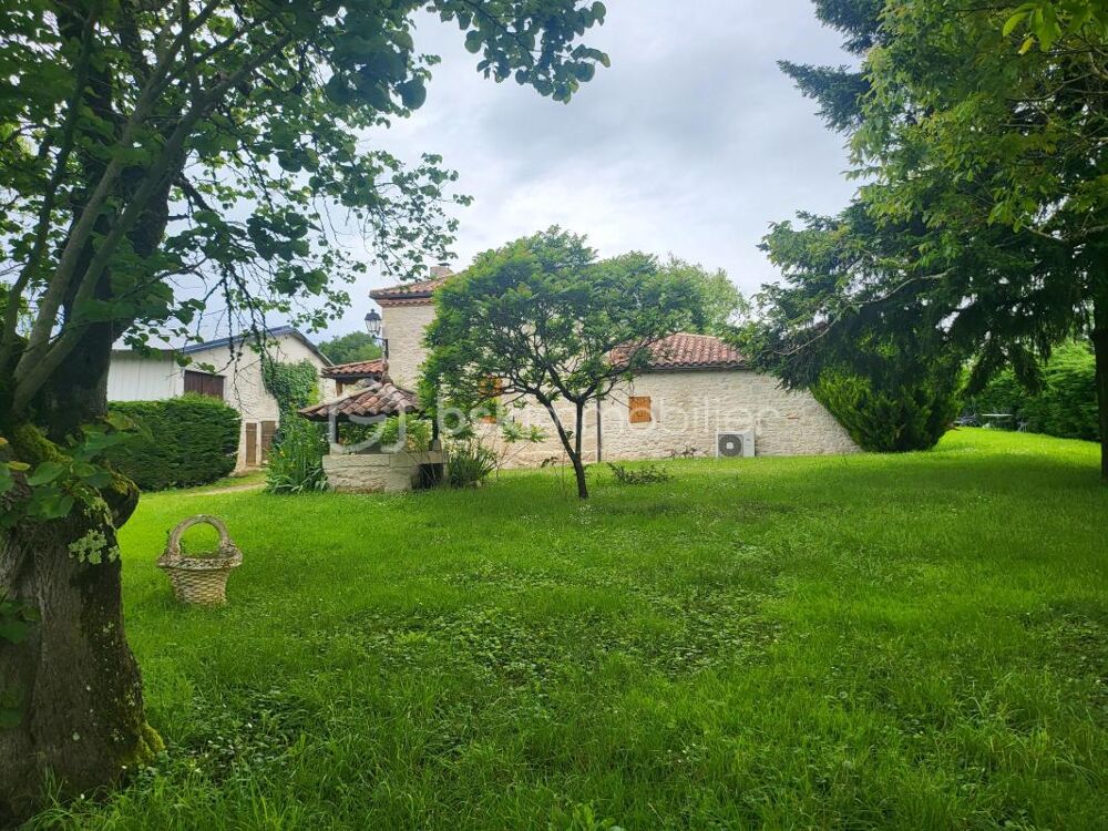 MAISON EN PIERRE+ MAISON LOCATIVE-HANGAR ET DEPENDANCES SUR PARCELLE DE 8000 m²