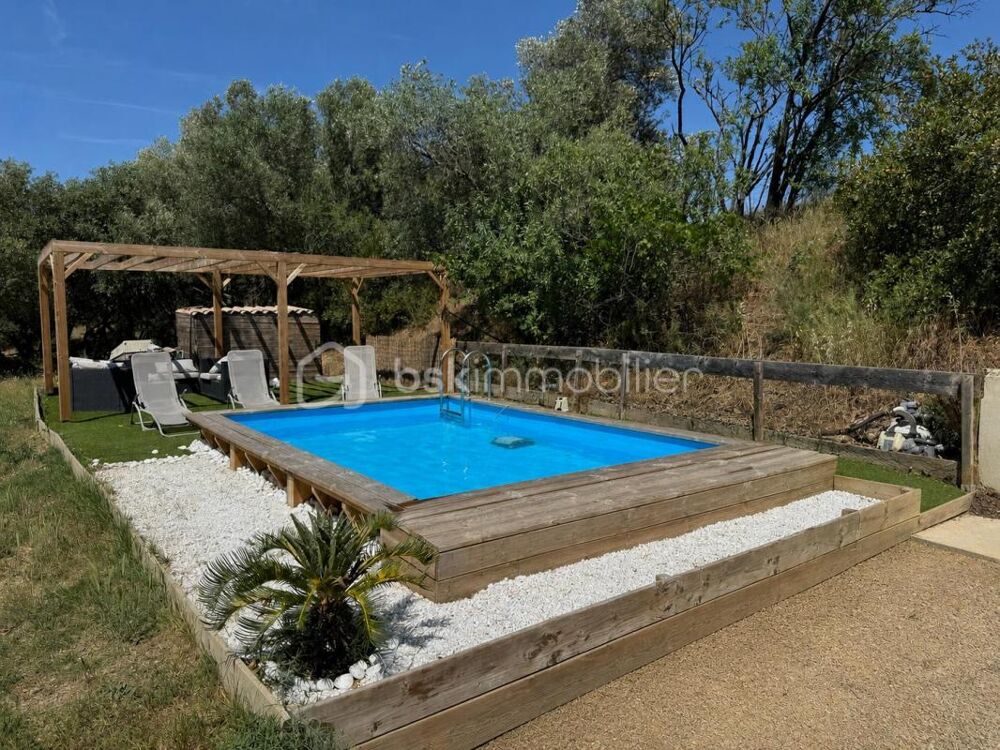 COUP DE COEUR ** MAISON EN PIERRE RÉNOVÉE ** ENVIRON 3 225 m² DE TERRAIN ** PISCINE ** SANS VIS-À-VIS ** BEAU POTENTIEL **