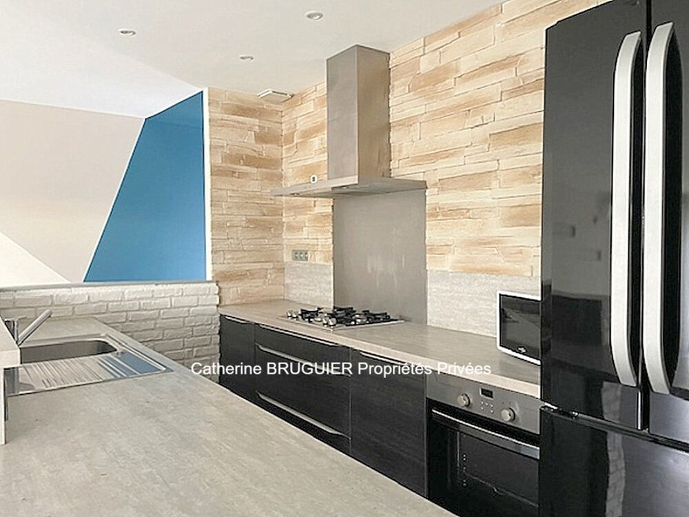 Maison de plain-pied 116 m² - Centre village - Classe A -3 chambres - garage - jardin clos