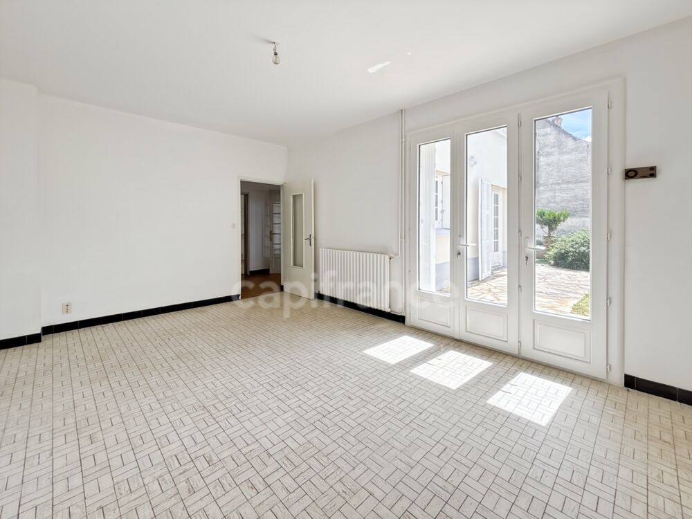 Vente Immeuble Maison avec local commercial à vendre centre ville SAVIGNE L'EVEQUE (72) Savigne l eveque
