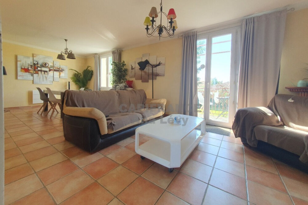 Maison 165m², garage aménagé en studio, parcelle de plus de 1100m²