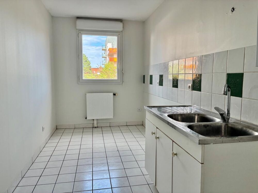 CENTRE VILLE T4 78M² AVEC GRAND BALCON ET PARKING EN CARPORT