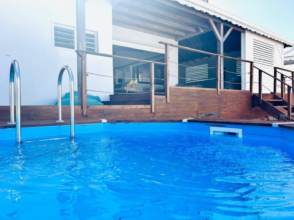 Location Maison LE MOULE MAGNIFIQUE VILLA MEUBLEE 3 CHAMBRES PISCINE VUE MER Le moule