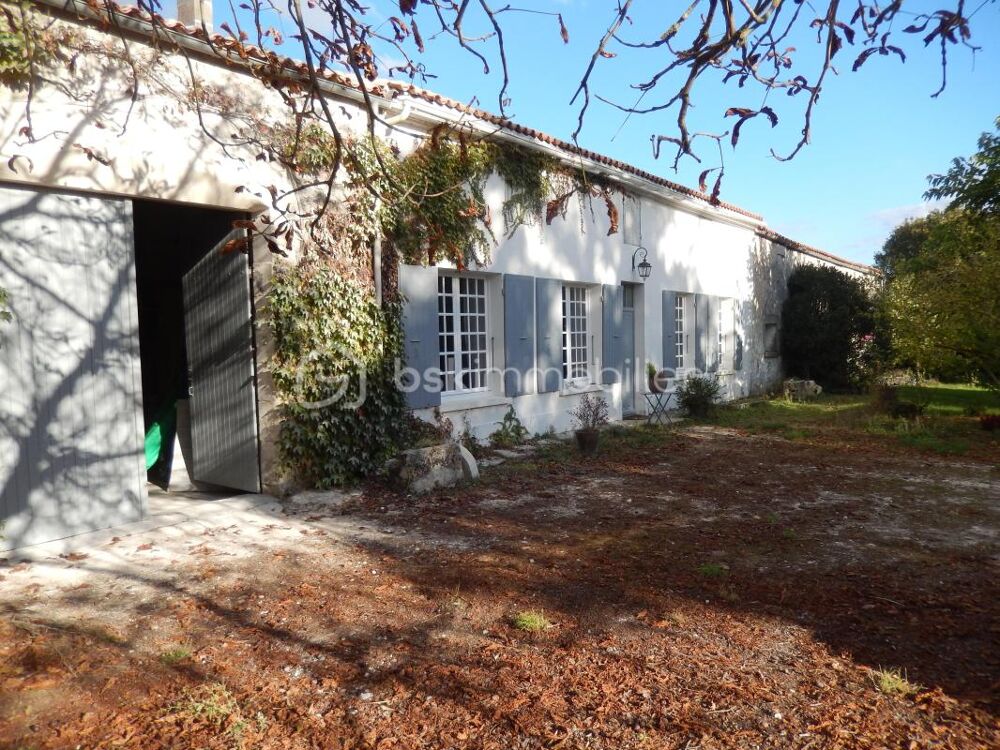 2 maisons d'habitation, dépendances, 1ha de terrain