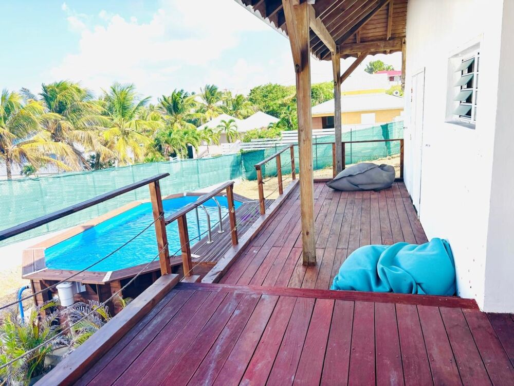 Location Maison LE MOULE MAGNIFIQUE VILLA MEUBLEE 3 CHAMBRES PISCINE VUE MER Le moule