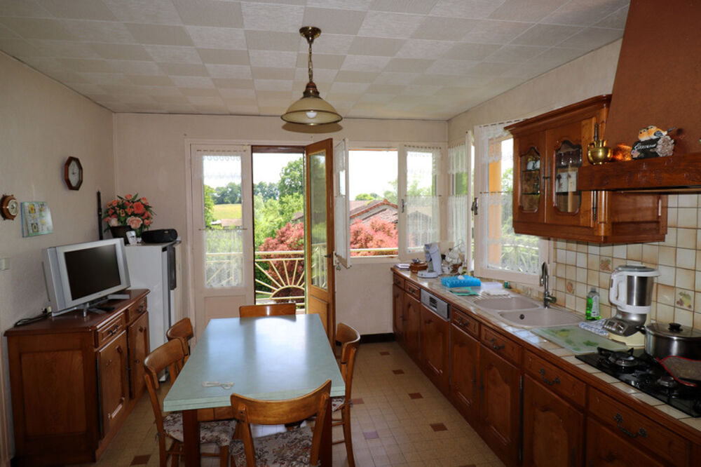 Jolie villa de 117 m² à fort potentiel avec un beau terrain arboré à CURCIAT DONGALON (01)