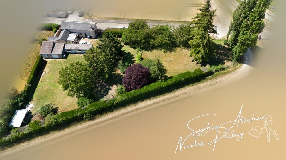 Maison avec dépendances et terrain constructible à Toury