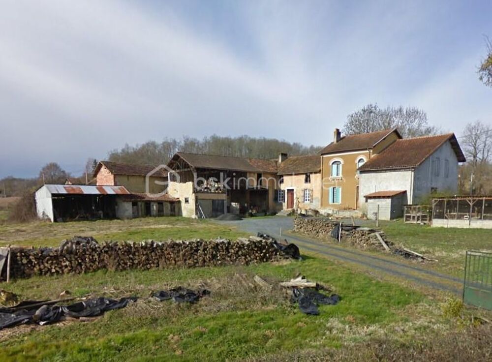 Ancien corps de ferme composé de 2 habitations, 6 pièces, 4 chambres avec dépendances sur un terrain de 6602m2