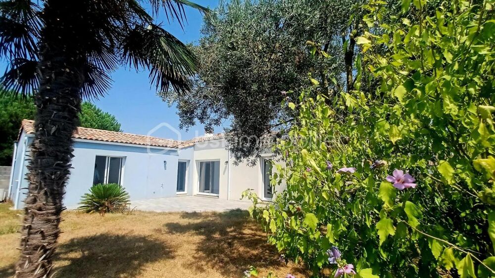 Maison contemporaine de plain-pied avec jardin