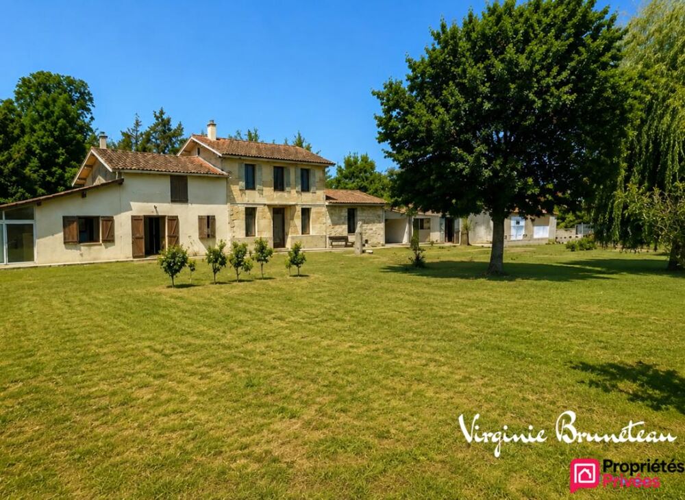 Deux maisons indépendantes - Grand garage 90 m² - Jardin arboré - Fort potentiel