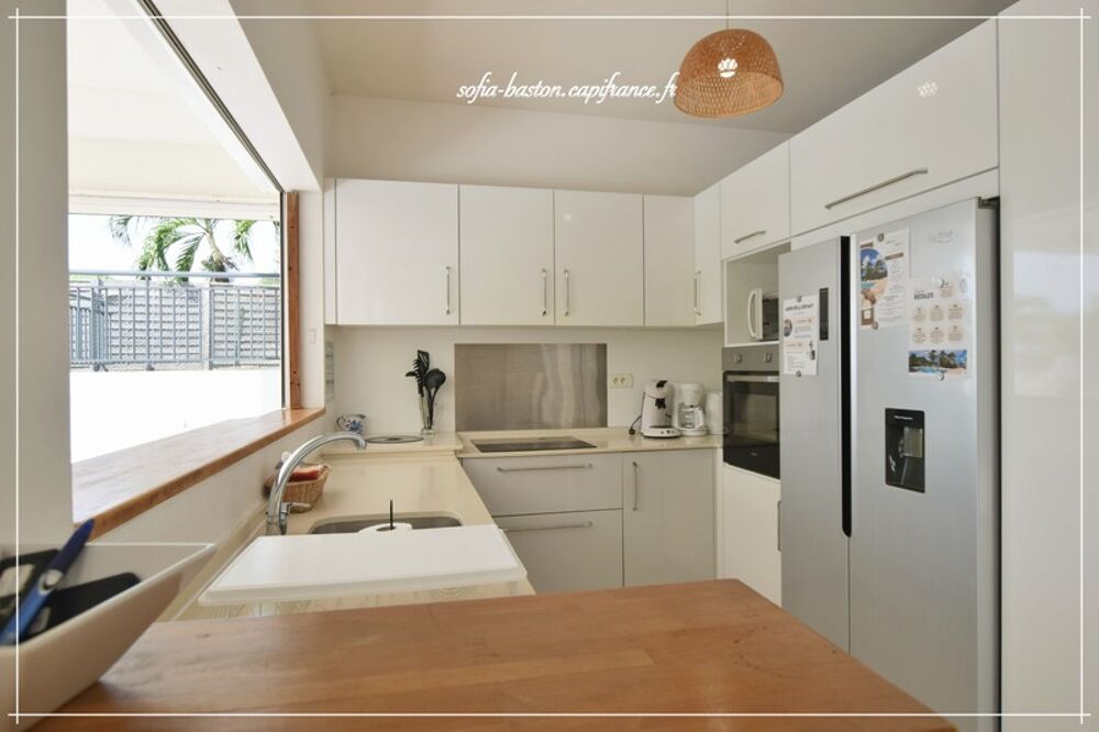 Les Trois-Îlets  Villa prestige T5 de 146 m² habitables (219 m² au total) avec piscine, solarium et vue mer imprenable- A Vendr