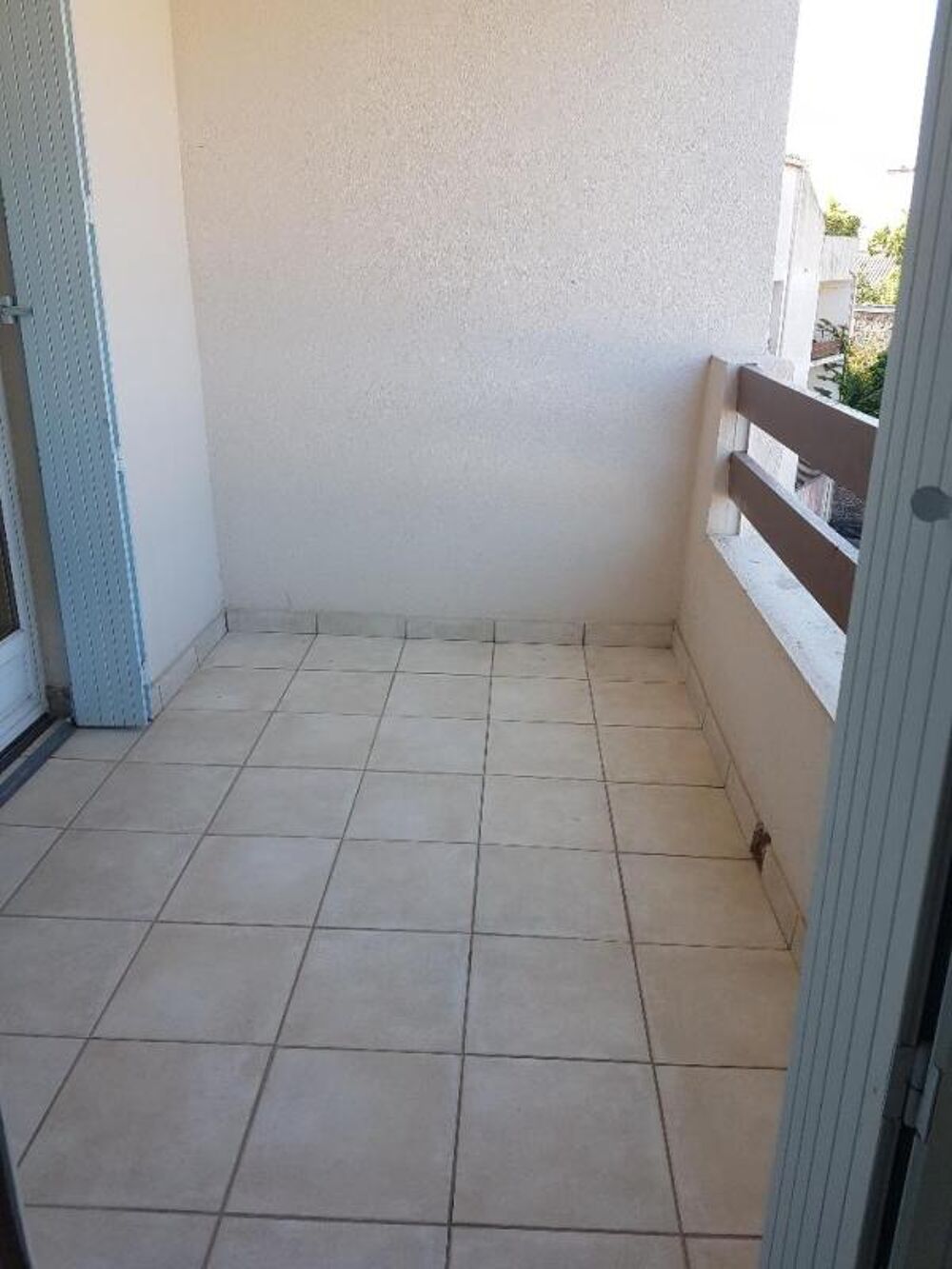 Appartement type 2 - dans immeuble proche du centre ville - quartier calme -