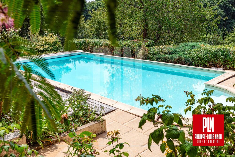 À 5MN du Mans, une propriété d'architecte rare réunissant 2 chambres de plain-pied, une piscine et un magnifique parc paysager