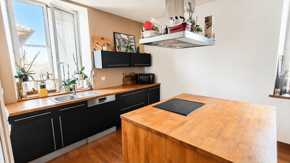 Duplex T3 lumineux avec espace bureau  Dernier étage  Faibles charges  Centre-ville